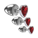 Adam & Eve Three Hearts Gem Anal Plug Set featuring three graduated aluminum plugs with red heart jewels.