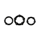 Adam & Eve Adam's Pleasure Kit For Him includes three black cock rings for enhanced pleasure.