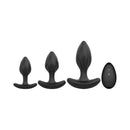 Adam & Eve Vibrating Anal Trainer Set featuring three soft silicone plugs and a remote control.