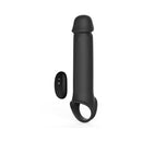 Adam & Eve Adams Xl Vibrating Extension Silicone With Remote Control displayed next to its remote control.