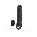 Adam & Eve Adams Xl Vibrating Extension Silicone With Remote Control next to its remote, showcasing powerful pleasure tool design.