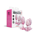 Adam & Eve Glitter Gem Butt Plug Set Pink displayed in packaging with three graduated glittery plugs.