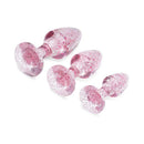 Adam & Eve Glitter Gem Butt Plug Set Pink featuring three graduated plugs with pink glitter.