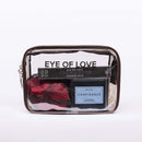 Eye of Love Love in Transit Confidence Attract Her Pheromone Gift Set in a clear travel pouch with products inside.