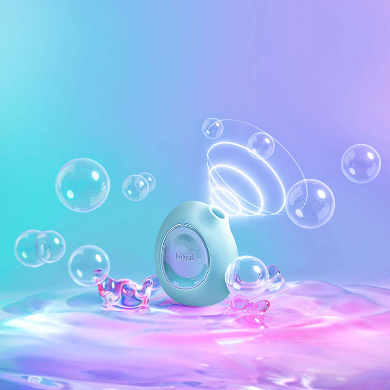 Biird Lumii Clitoral Suction Stimulator Mint on a colorful, bubbly background showcasing its design and features.
