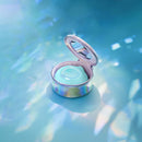 Biird Lumii Clitoral Suction Stimulator Mint in elegant case on a shimmering background.