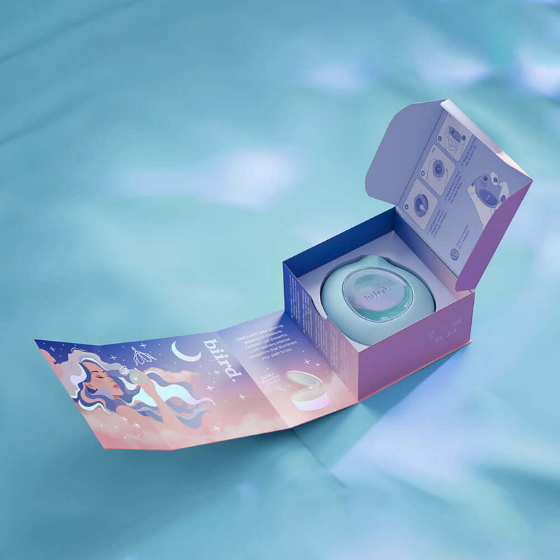 Biird Lumii Clitoral Suction Stimulator Mint in colorful packaging with open box and product displayed inside.