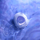 Biird Lumii Clitoral Suction Stimulator Lilac in a soft blue background with water droplets.