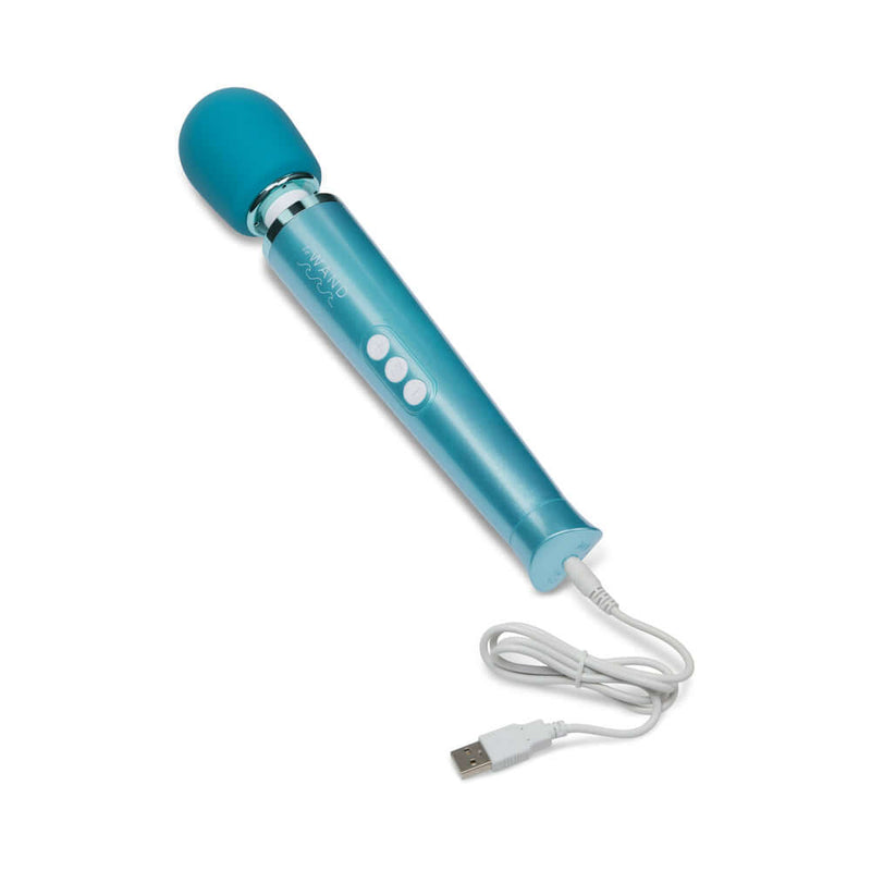 Le Wand Dive Submersible Rechargeable Vibrating Massager in turquoise with USB charging cable.