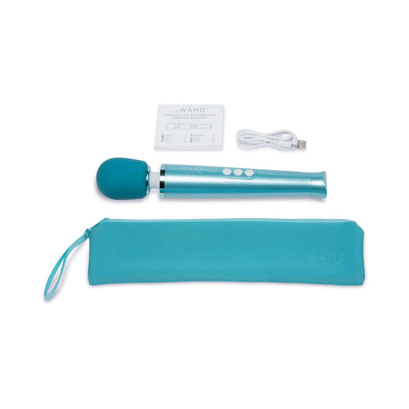Le Wand Dive Submersible Rechargeable Vibrating Massager with accessories and storage pouch.