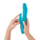 FemmeFunn Booster Rabbit Vibrator XL Turquoise held in hands showcasing its design and features.
