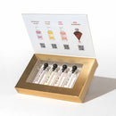Eye Of Love Pheromone Parfum Attract Him 4-Piece Sample Set showcasing four mini fragrance vials in a golden box.