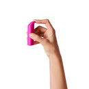 A hand holding the Dame Zig Lipstick Vibrator Pink, showcasing its sleek design for portable pleasure.
