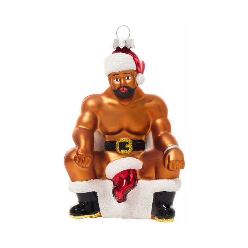 Cheeky Pornament Boss Hog, hand blown glass ornament featuring a humorous muscular figure in a Santa hat.