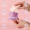 Sweetums Individual Wipes Honey Lavender in hand, highlighting vegan, cruelty-free, and ph balanced features.