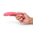 Je Joue ILY The Wand Flexible Warming G-Spot Wand held in hand, showcasing its ergonomic design.