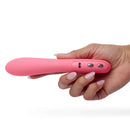 Je Joue ILY The Wand Flexible Warming G-Spot Wand held in a hand, showcasing its sleek design and control buttons.