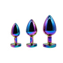 Adam & Eve Rainbow Heart Anal Plug Training Set features three graduated metal plugs in shimmering rainbow chrome.