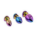 Adam & Eve Rainbow Heart Anal Plug Training Set featuring three graduated metal plugs with shimmering rainbow chrome finishes.