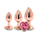 Adam & Eve Rose Gold Pink Heart Anal Plug Training Set featuring three graduated plugs with heart-shaped jewel bases.