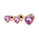 Adam & Eve Rose Gold Pink Heart Anal Plug Training Set featuring three graduated plugs with heart-shaped jewels.
