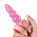 Adam & Eve Bumpy Bubbles 4.25 Inch Anal Plug Pink held in hand showcasing its graduated bubble design.