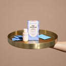 Playground Late Checkout Couples Intimacy Set displayed on a tray with lubricant and condoms.