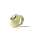 CB-X Glow-in-the-Dark Mini-Me Chastity Cage Kit with padlock and modular components.