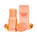Sweetums Sweet Spot Flavored Fragrance Juicy Peach in a peach-colored stick with packaging.