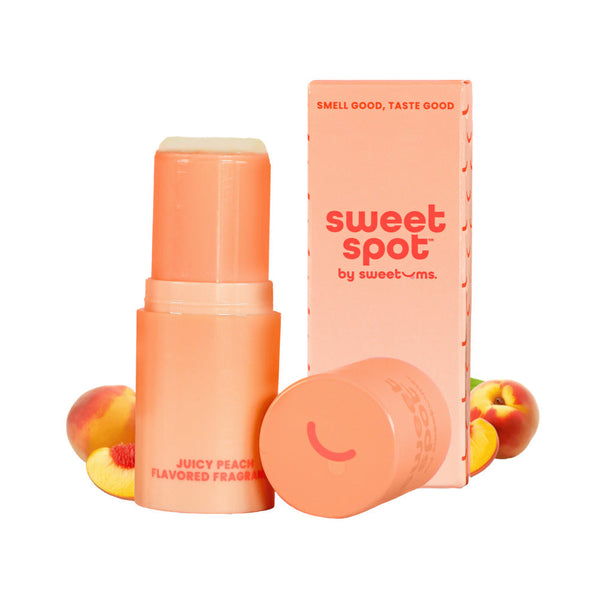 Sweetums Sweet Spot Flavored Fragrance Juicy Peach in a peach-colored stick with packaging.