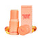 Sweetums Sweet Spot Flavored Fragrance Juicy Peach in a peach-colored stick with packaging.