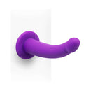 Together Tilt 6.5 inch Silicone Dildo and Harness Set Purple, a uniquely curved silicone dildo in vibrant purple.