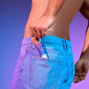 Love To Love Release Me P-spot Stimulating Gel 1 Oz in a man's back pocket ready for use.