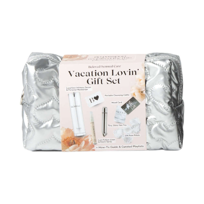 Beloved Vacation Lovin Gift Set in a quilted silver carrying case with intimate care products, cleansing cloths, and a sex toy.