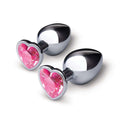b-Vibe Jewel Metal Training Plug Set featuring sleek metal plugs with elegant pink jeweled heart bases.