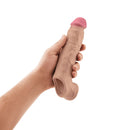 Shaft Vibrating Model F Penis Sheath Size 2 Pine held in hand, showcasing realistic texture and design.
