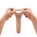 Shaft Vibrating Model F Penis Sheath Size 2 Pine being stretched to showcase its flexibility and realistic texture.