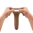 Shaft Vibrating Model F Penis Sheath Size 2 Oak being stretched for demonstration.