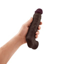 Shaft Vibrating Model F Penis Sheath Size 2 Mahogany in hand showcasing realistic design and premium materials.