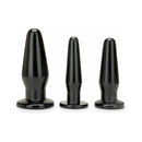 Me You Us Anal Training Kit 3-Piece Plug Set displaying three black anal plugs of varying sizes.