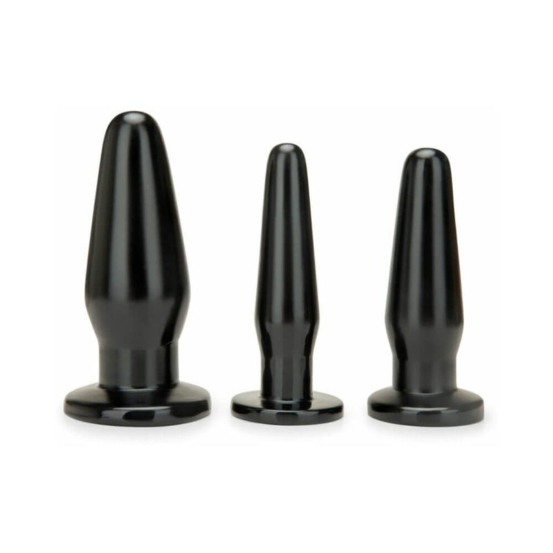 Me You Us Anal Training Kit 3-Piece Plug Set displaying three black anal plugs of varying sizes.