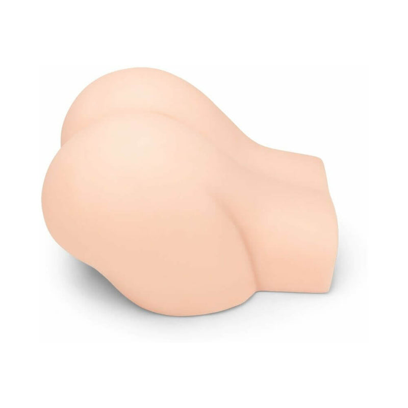 Me You Us Ultra Masturbator Vanilla showing a lifelike round, spankable booty designed for realistic pleasure.