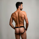 Prowler RED Switch Jock Strap Large Black with interchangeable patches showing 'TOP' worn by a model from the back.