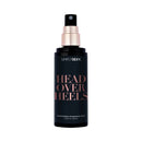 Simply Sexy Pheromone Body Mist Head Over Heels 3.35 oz bottle with black and gold design.
