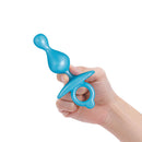b-Vibe Butties Pop Beaded Silicone Plug held in hand, showcasing its flexible design and beaded feel.