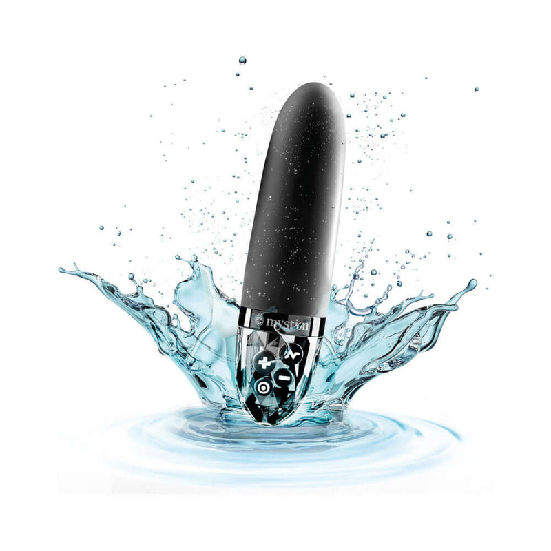 Mystim Sleak Freak E-Stim Vibrator Black splashing in water, showcasing sleek design and functionality.