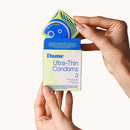 Dame Ultra Thin Condoms 3-Pack box being opened, showcasing the premium design and brand packaging.