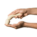 A person holding the Dame Min Mini Wand Vibrator Butter, showcasing its compact design and soft material.