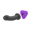 Banana Pants Kissi Strap-On Stimulation Cushion Purple with a black dildo, featuring a heart-shaped purple cushion attachment.