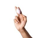 Dame Fin 2.0 Finger Vibrator Quartz on a hand showcasing its intuitive design and flexible fit.